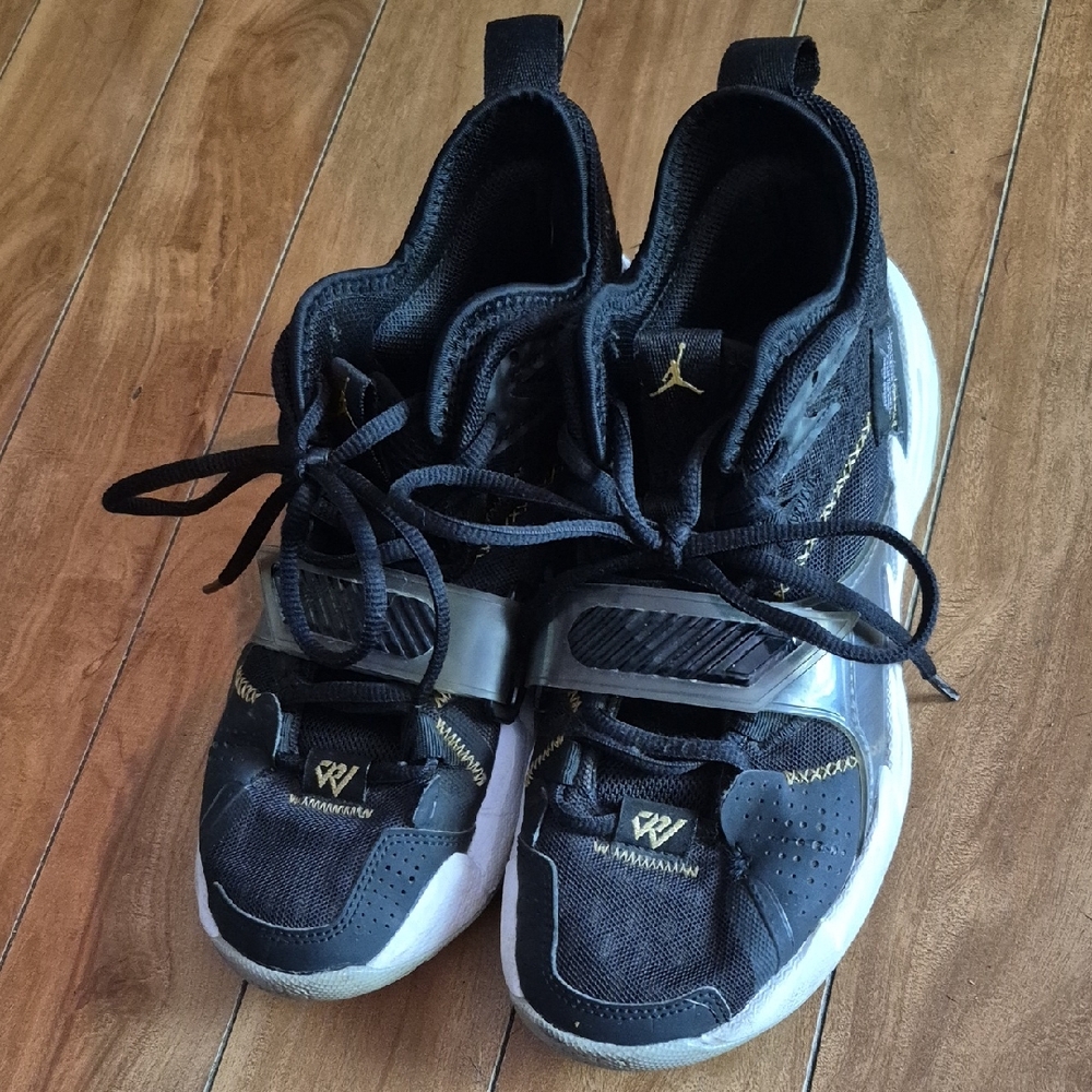 Jordan Kids Black and Gold Sneakers